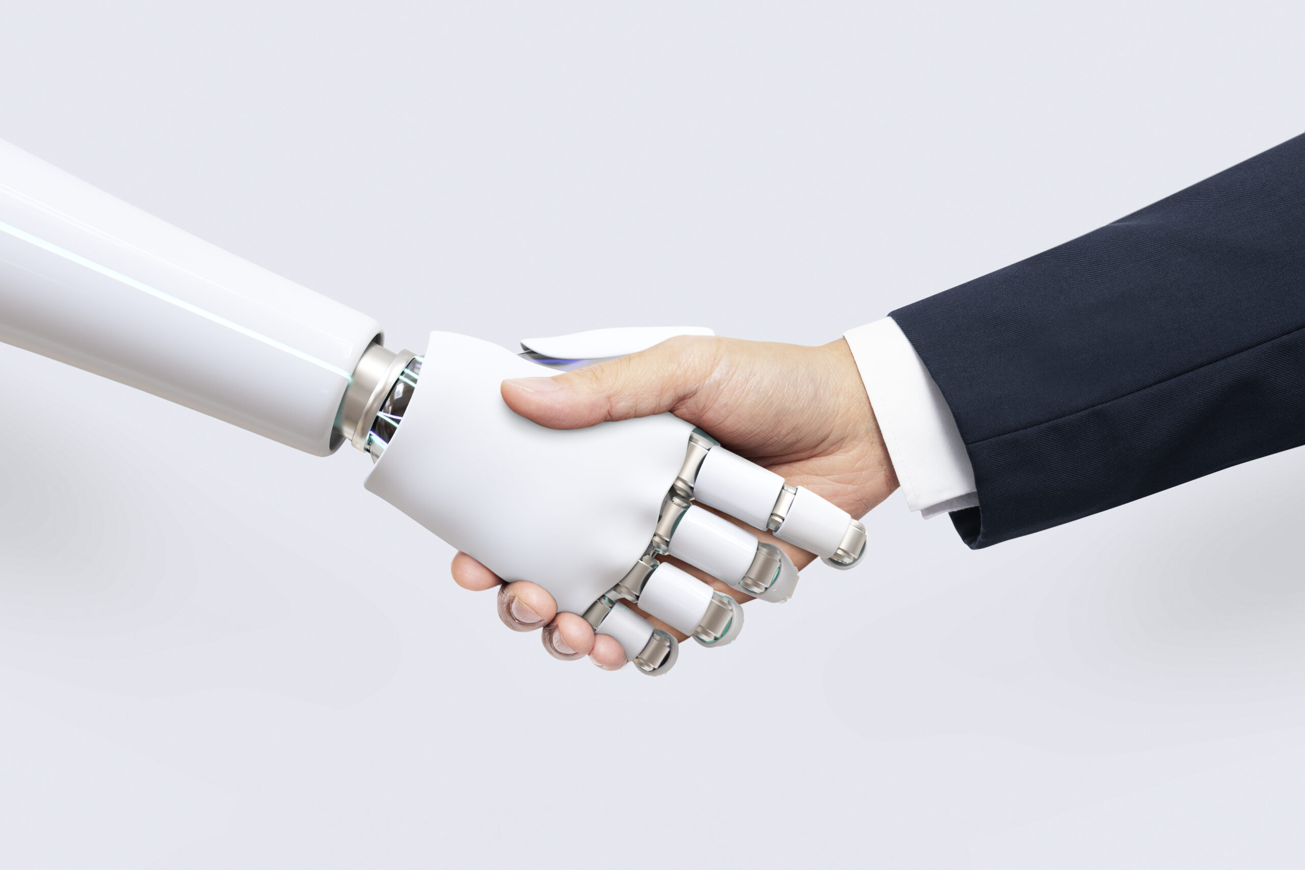 Робот жмёт руку человеку